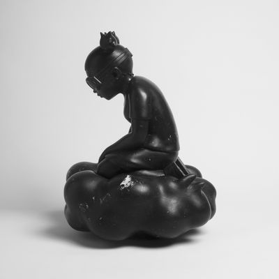black marble statue by Hebru Brantley