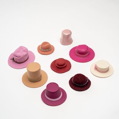 nine felt hats in different styles and colours