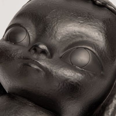 Bronze sculpture of person with tears, KIRA (Black) by Roby Dwi Antono - detail shot