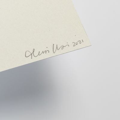 Close-up of a signature on the artist page