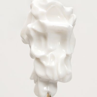 white marble sculpture on a bronze pole by Kevin Francis Gray - close up