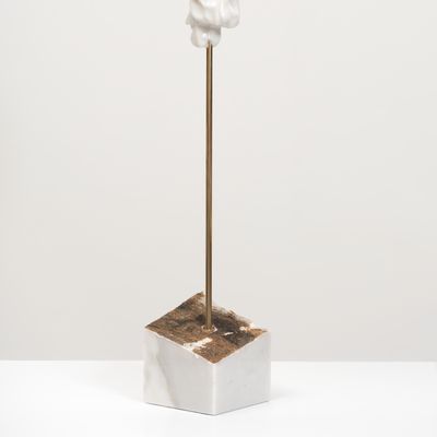 white marble sculpture on a bronze pole by Kevin Francis Gray - back view