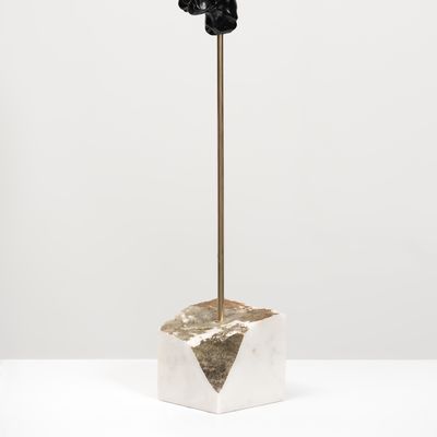 black marble sculpture on a bronze pole by Kevin Francis Gray - side view