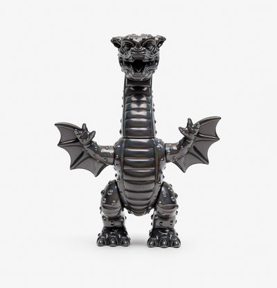a hero shot of a metallic grey sculpture of a dragon