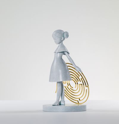 Bronze sculpture with blue/grey flecked patina of girl holding maze, Maze by James Jean