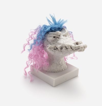 a sculpture of a crocodile head with a custom hair piece in blue and pink, Nathalie Djurberg & Hans Berg