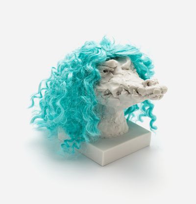 a sculpture of a crocodile head with a custom hair piece in deep turquoise, Nathalie Djurberg & Hans Berg