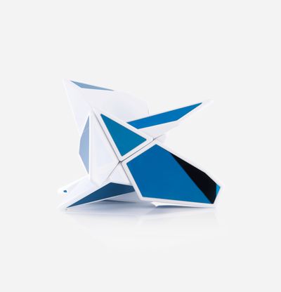 a blue and white sculpture built fro triangle shaped blocks - side view