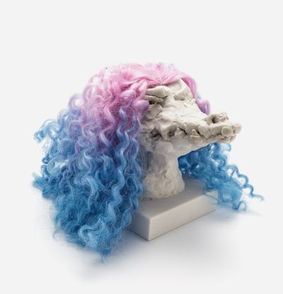 a sculpture of a crocodile head with a custom hair piece in pink and blue gradient, Nathalie Djurberg & Hans Berg