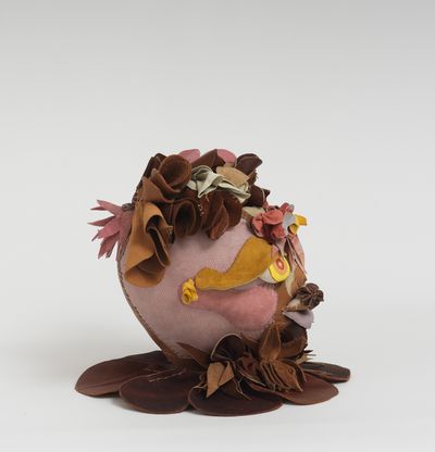 Soft sculpture of leather and cloth, Soleil by Tau Lewis