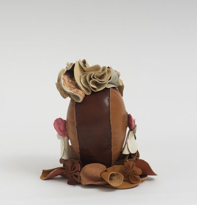 Soft sculpture of leather and cloth, Roots by Tau Lewis
