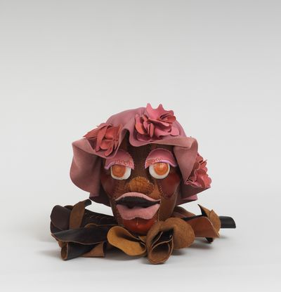 Soft sculpture of leather and cloth, Nutmeg by Tau Lewis