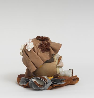 Soft sculpture of leather and cloth, Fawn by Tau Lewis