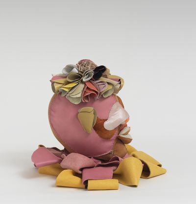Soft sculpture of leather and cloth, Melon by Tau Lewis