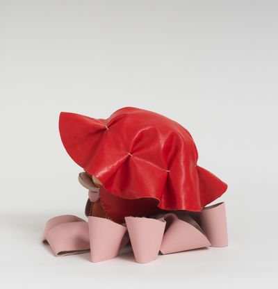 Soft sculpture of leather and cloth, Poppy by Tau Lewis