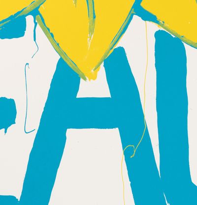 Up close of blue and yellow silkscreened word