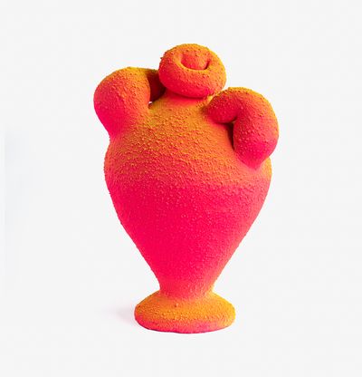 a neon pink and yellow coloured amphora sculpture with bulbous handles