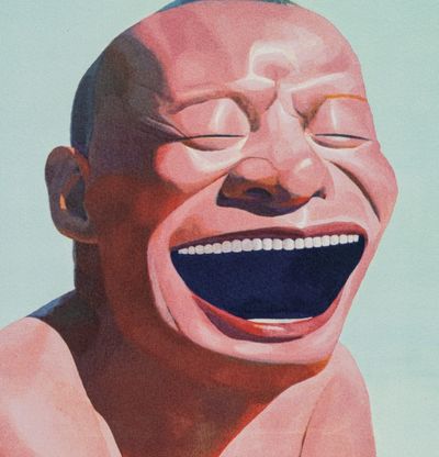 a detail of a laughing man kneeling down into the sea
