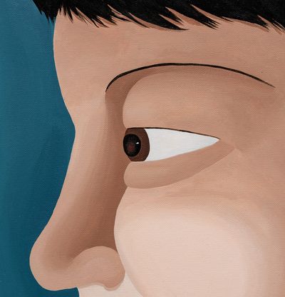 Boy with brown eyes on blue background