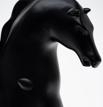 Cleon Peterson sleek black bronze horse sculpture in a small size