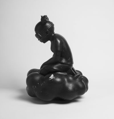 black marble statue by Hebru Brantley
