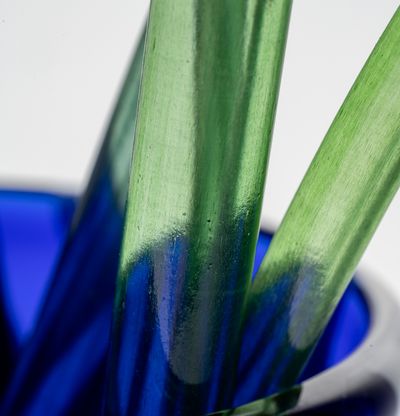Striped glass vase with glass flower stalks
