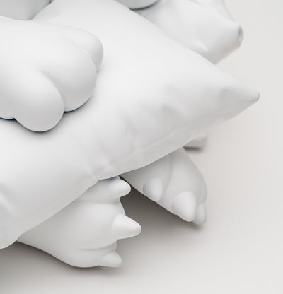 up close of cat paws in sculpture rendered in white