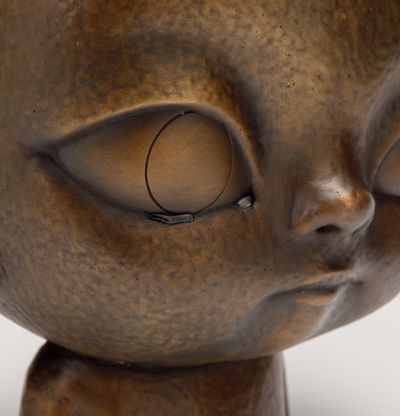 Bronze sculpture of person with tears, KIRA (Burnished Gold) by Roby Dwi Antono - detail shot
