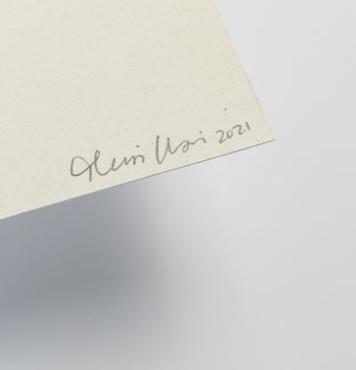 Close-up of a signature on the artist page