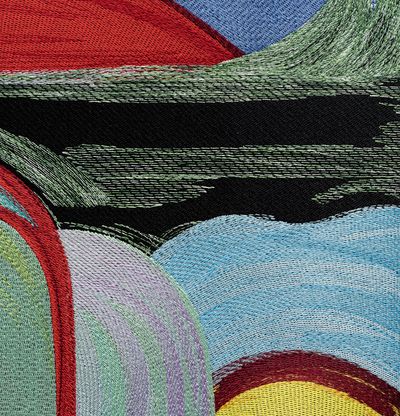 close up of a colourful embroidered tapestry