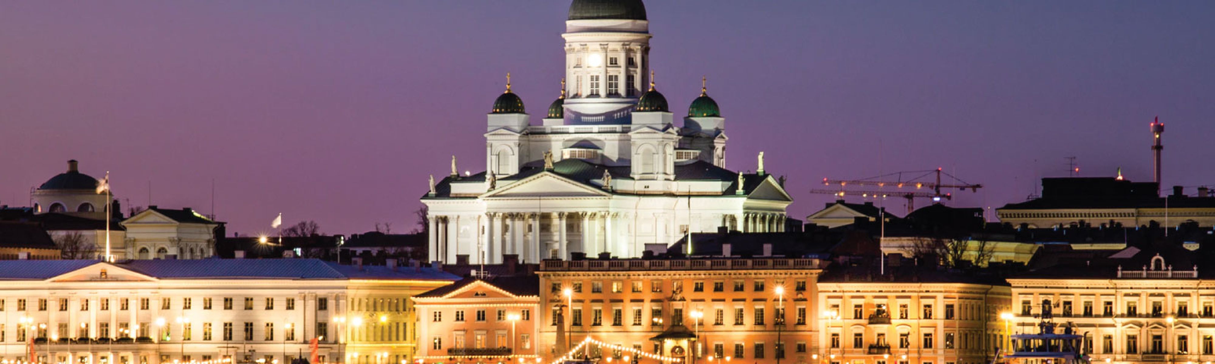 helsinki cathedral lit up at night in finland