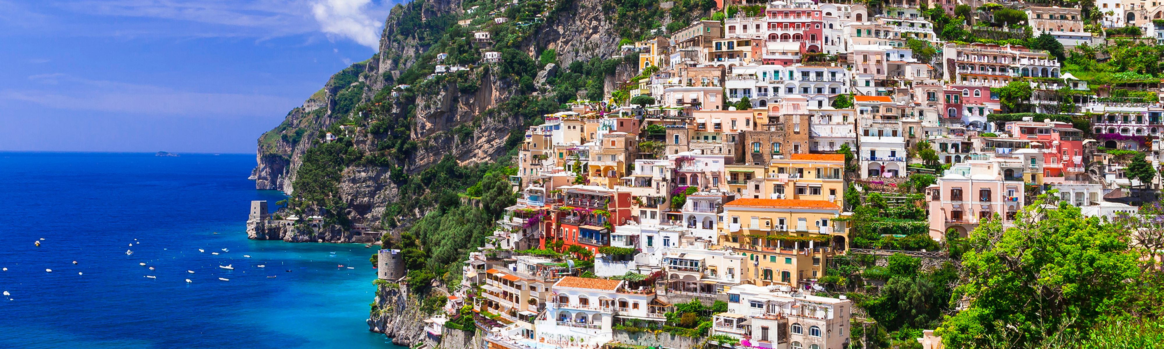colorful building going up a hill along the amalfi coast in italy