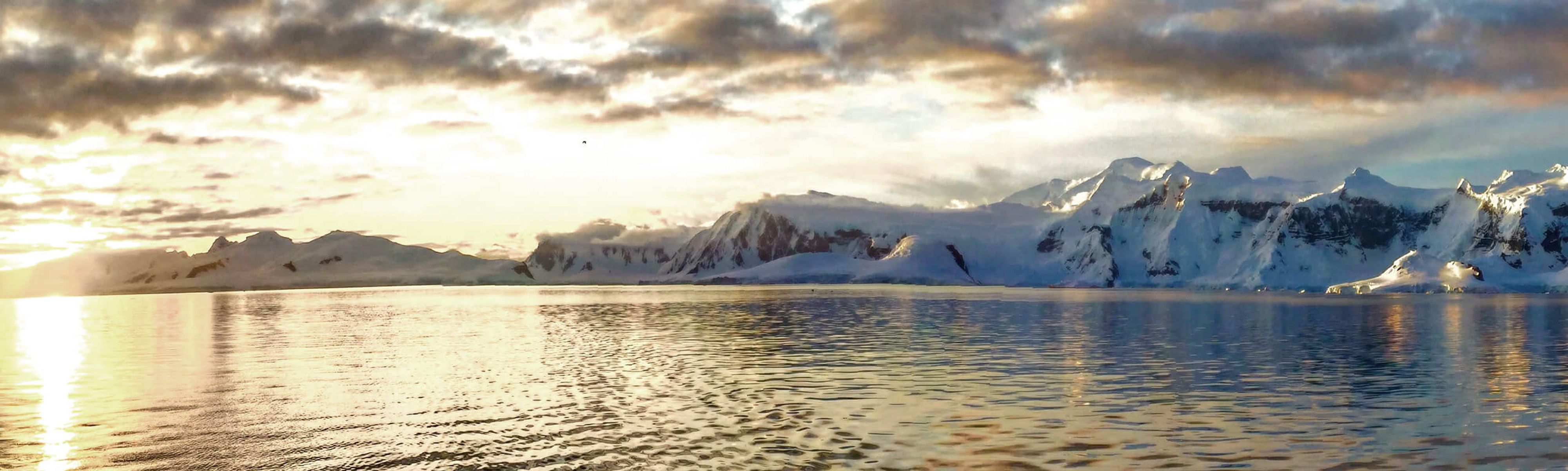 Glacier at water's edge in Antarctica