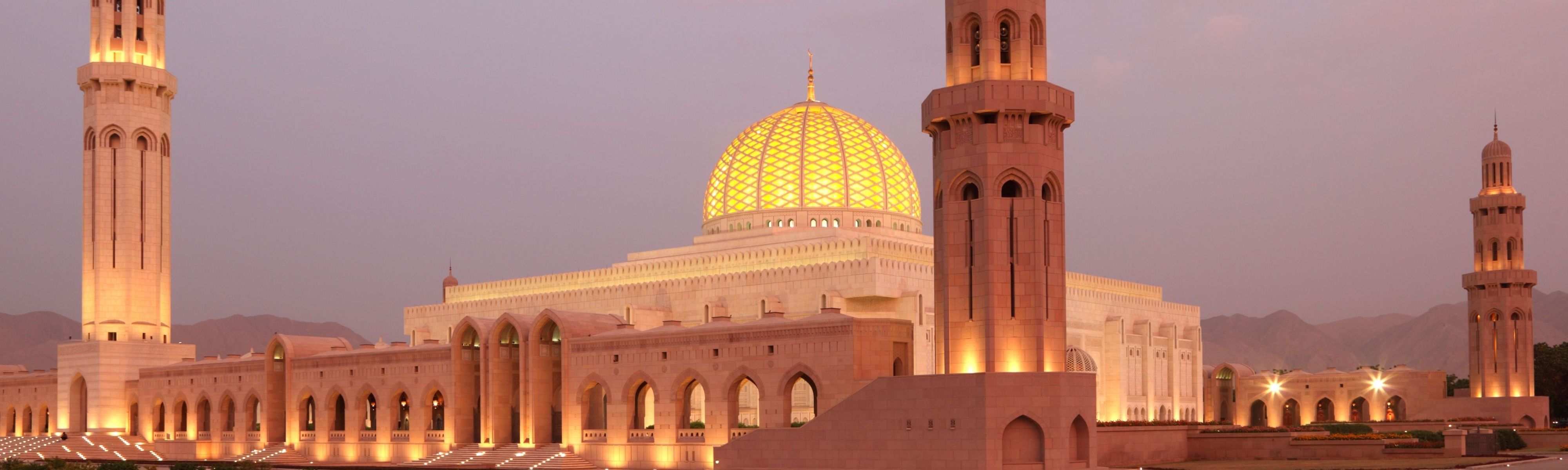 grand mosque in muscat oman at dusk