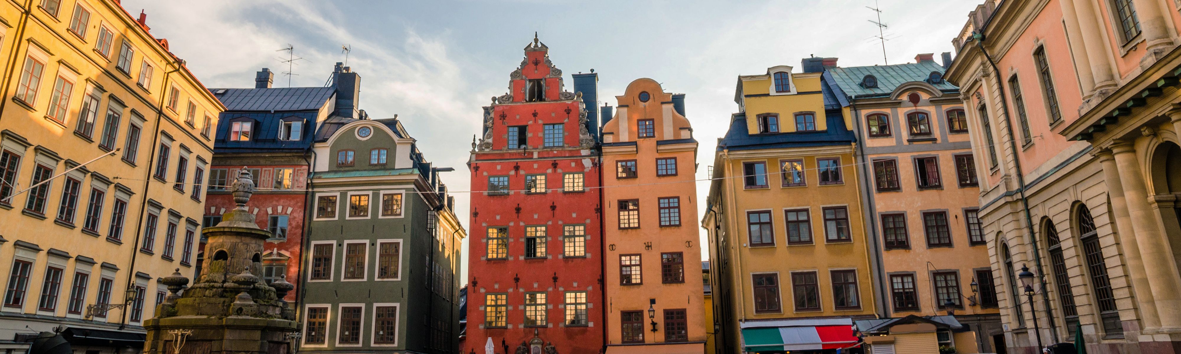 colored buildings in town square in sweden