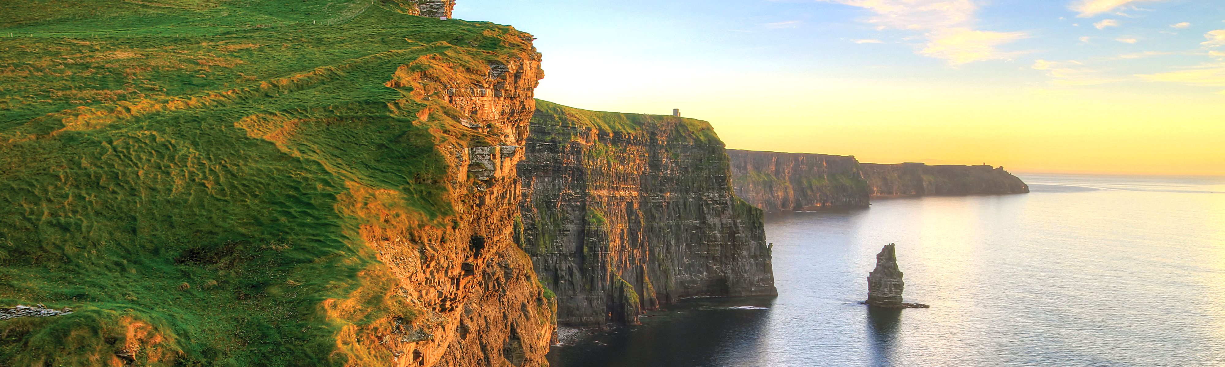 cliffs of moher in ireland at sunset
