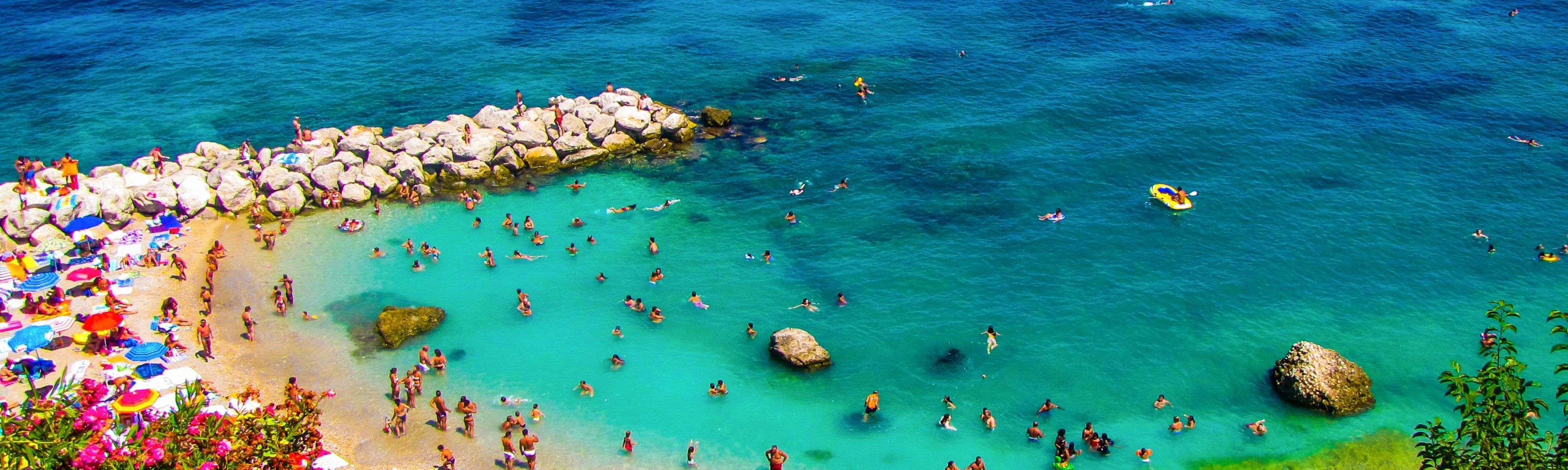 people at marina grande beach on the amalfi coast in italy