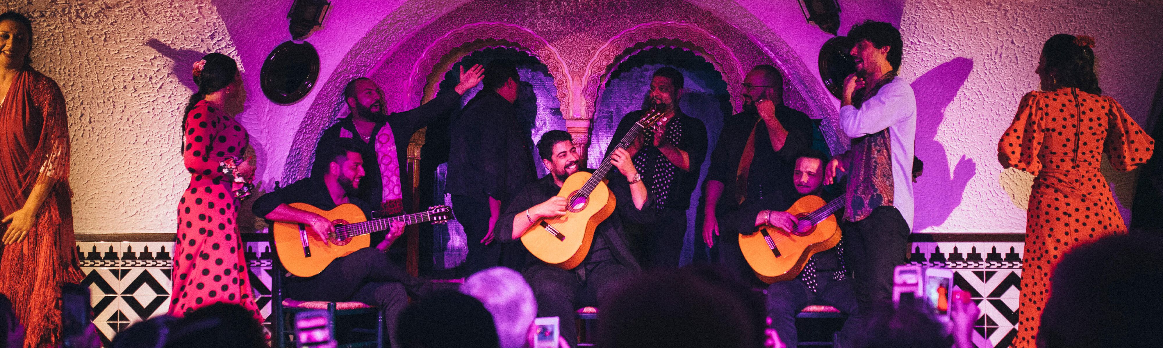 people in spain performing a flamenco show
