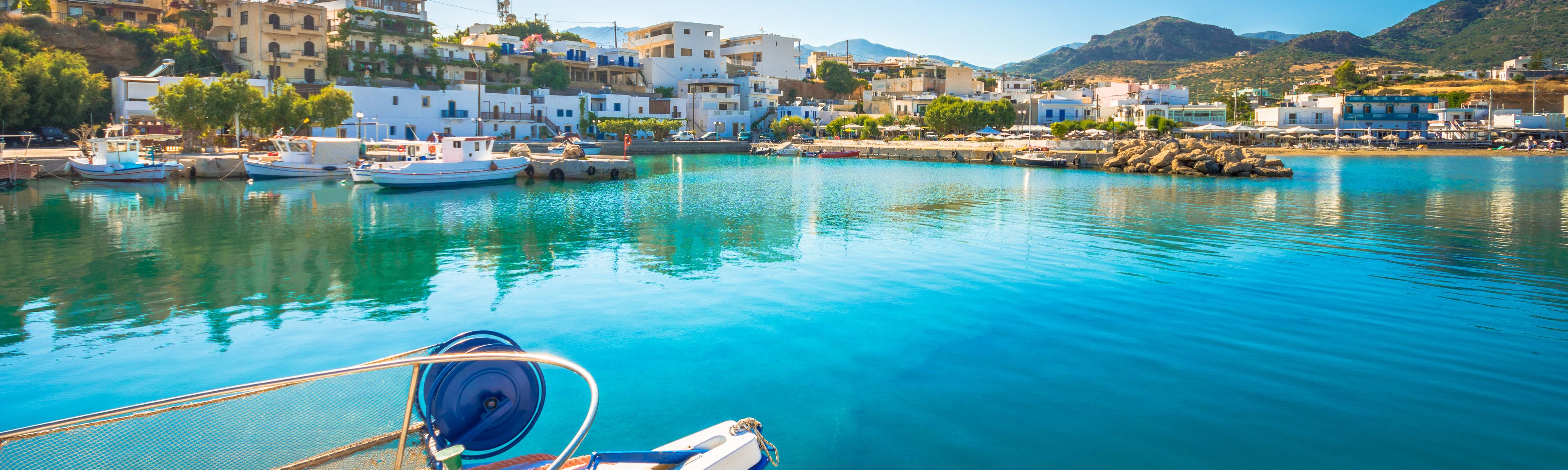 boats in a marina in crete greece