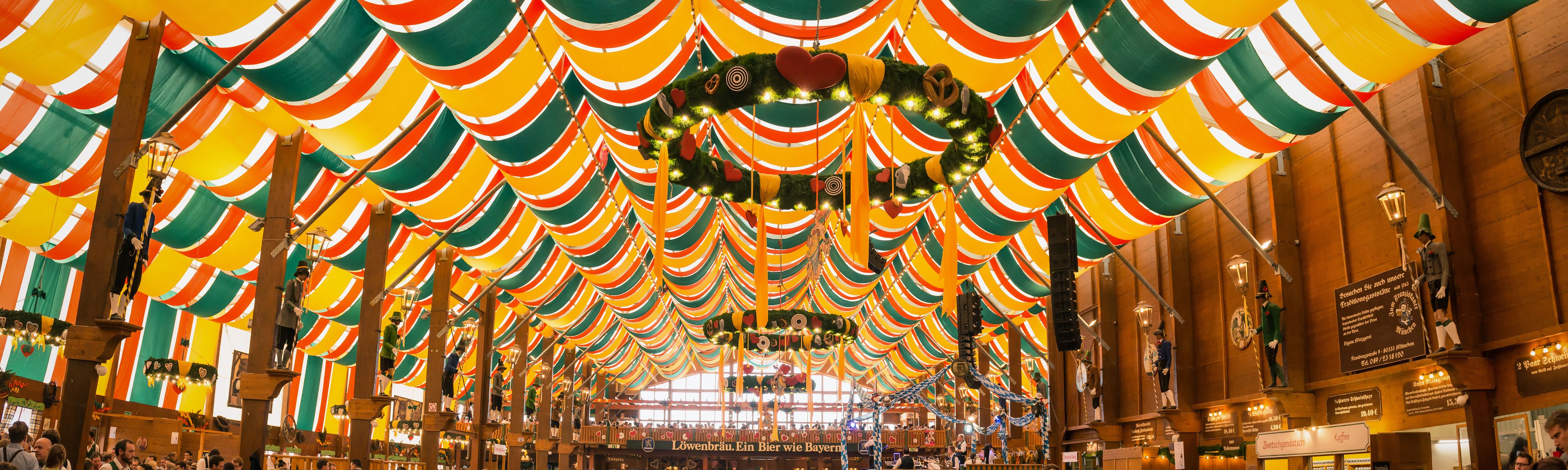 green yellow and red tent in oktoberfest hall in germany
