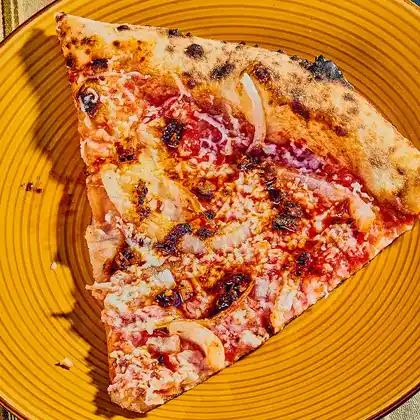 slice of pizza with Sichuan Chili Crisp drizzle