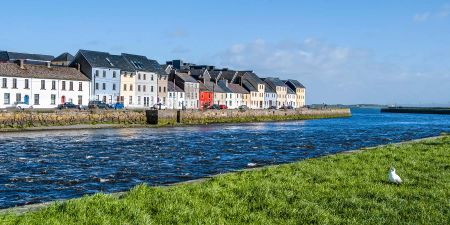 Claddagh village, colored houses along the River Corrib in Galway, Ireland