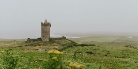 A castle on a rainy day in Ireland