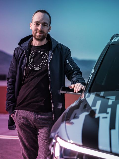 Marcus Kuehne, Co-founder & Director Intellectual Property, leaning on car