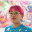 Hikari Shimoda dons pink hair and green glasses in a portrait