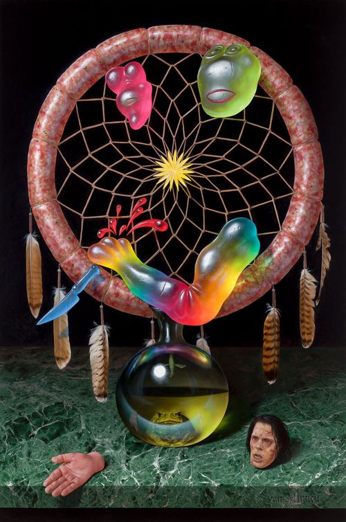 circular dreamcatcher shape with feathers hanging from it and gummy sweets making a smiley face