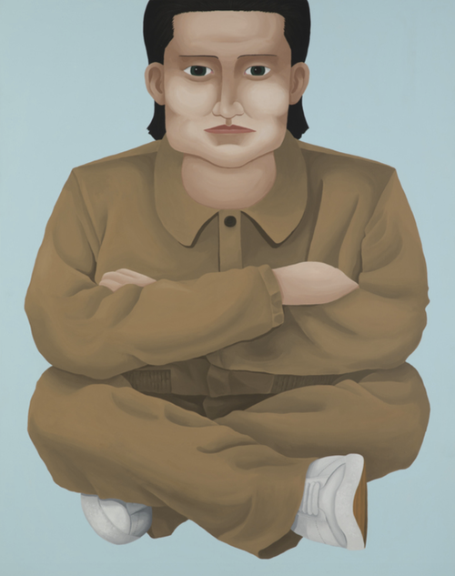 Crossed legged man in brown outfit with blue background