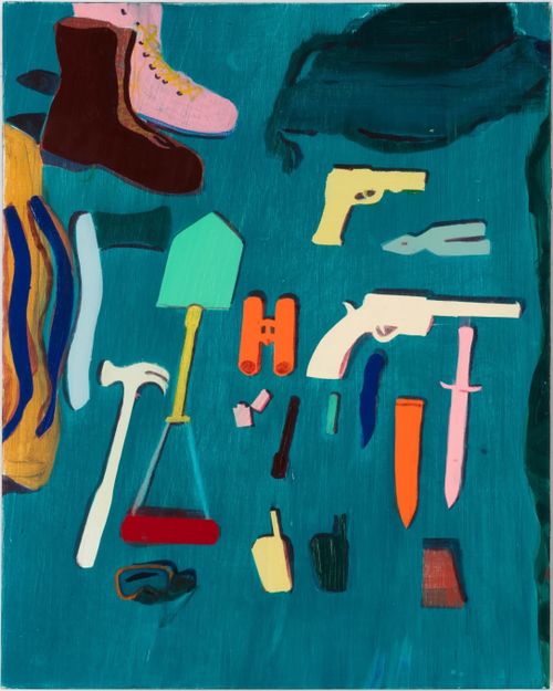 green floor with boots, tools and colourful objects placed on it