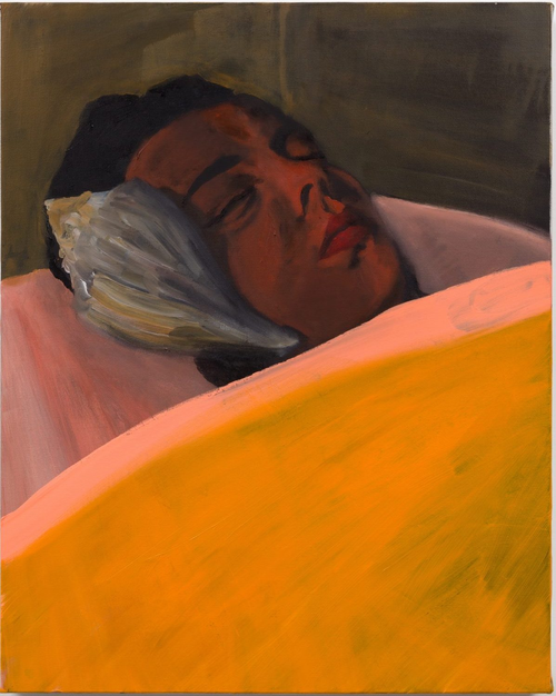 A person lying in a bed, with a shell 