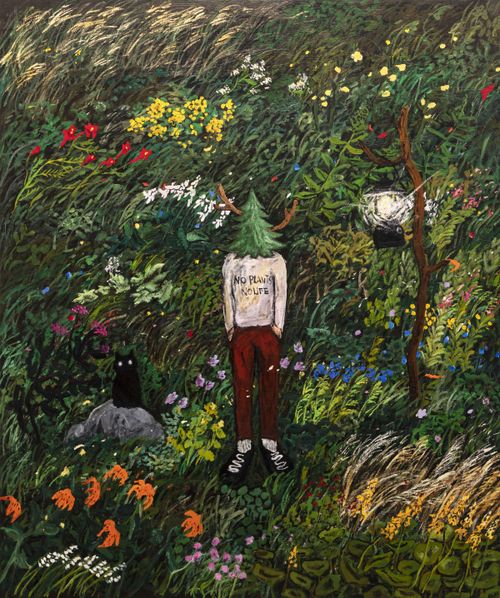 Reindeer man stands in colourful forest of flowers
